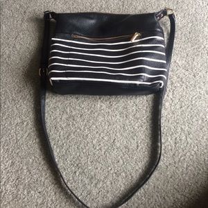 A black and white stripped purse